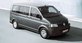 Volkswagen shuttle van on the road